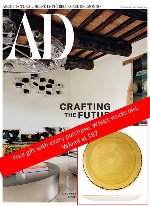 Cover of Architectural Digest magazine featuring a modern interior design with text 'Crafting the Future'.