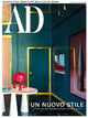Cover of Architectural Digest magazine featuring a modern interior design with a red chair and teal walls.