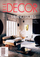 Cover of Elle Decor Italia magazine featuring a modern living room.