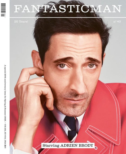 Adrien Brody in a red jacket on the cover of Fantastic Man magazine