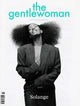 Solange smiling in a suit on the cover of The Gentlewoman