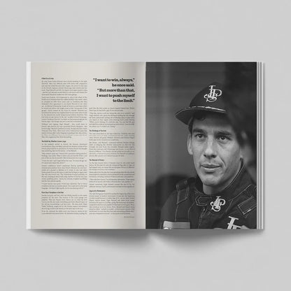 An open book or magazine spread shown against a light gray background. The left page contains columns of text, and the right page features a black-and-white portrait photo of a man wearing a cap with a stylized logo.