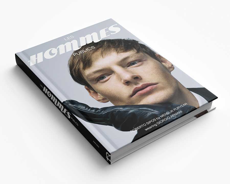 Book titled 'Les Hommes Publics' with a cover featuring Robert Sipos' face on a white background