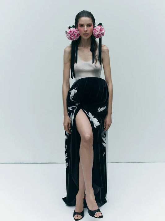 Vogue France magazine cover from May 2026 featuring model Libby Taverner seated on the floor. 