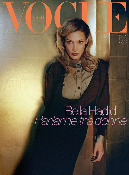 Vogue Italia magazine cover featuring Bella Hadid against a textured wall.