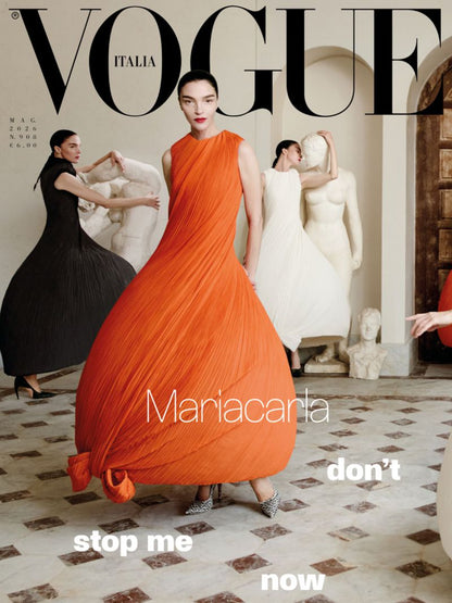 Vogue Italia magazine cover featuring Mariacarla in a dramatic pleated orange sleeveless gown.