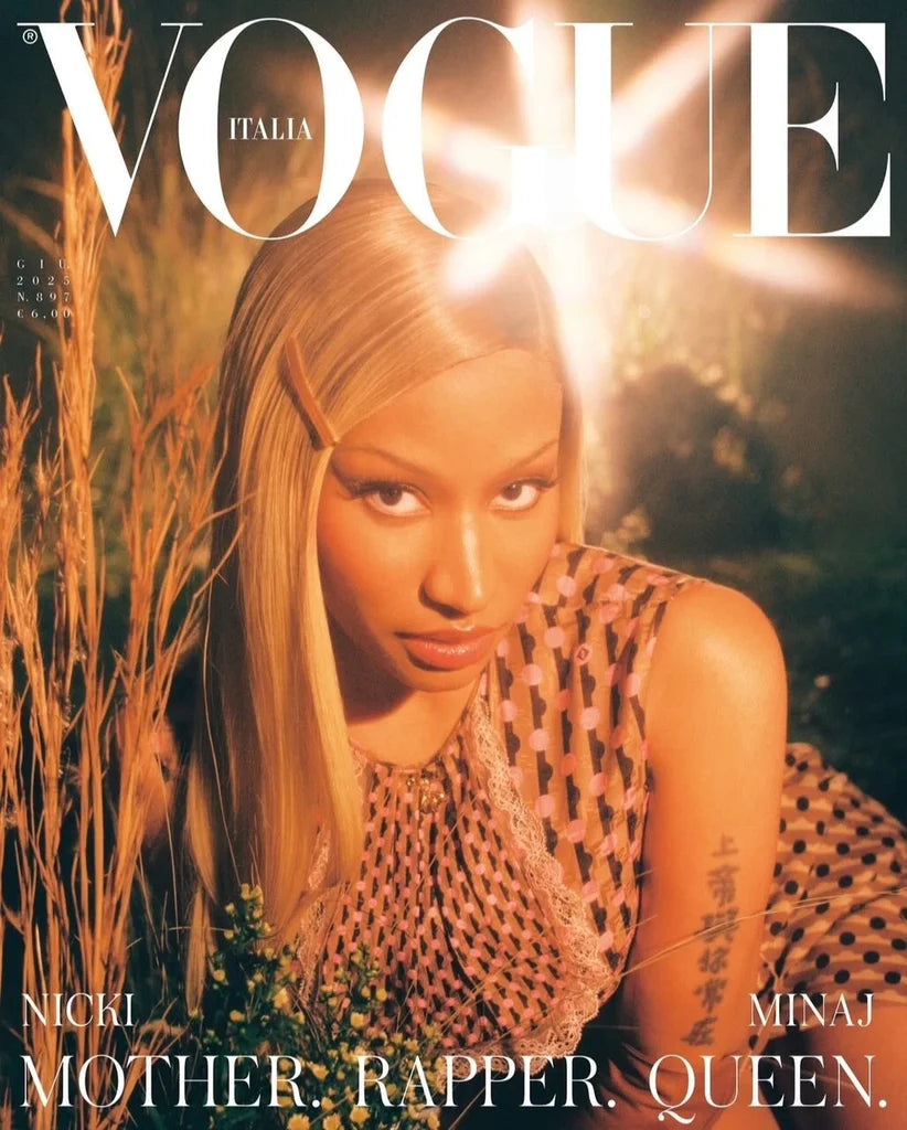 Nicki Minaj on cover of vogue Italy in brown dress on ground.